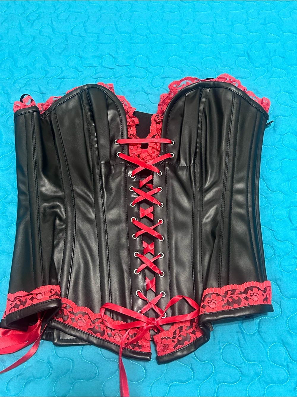 Daisy Corsets steel boned Black Faux Leather Corset with Red Lace Trim